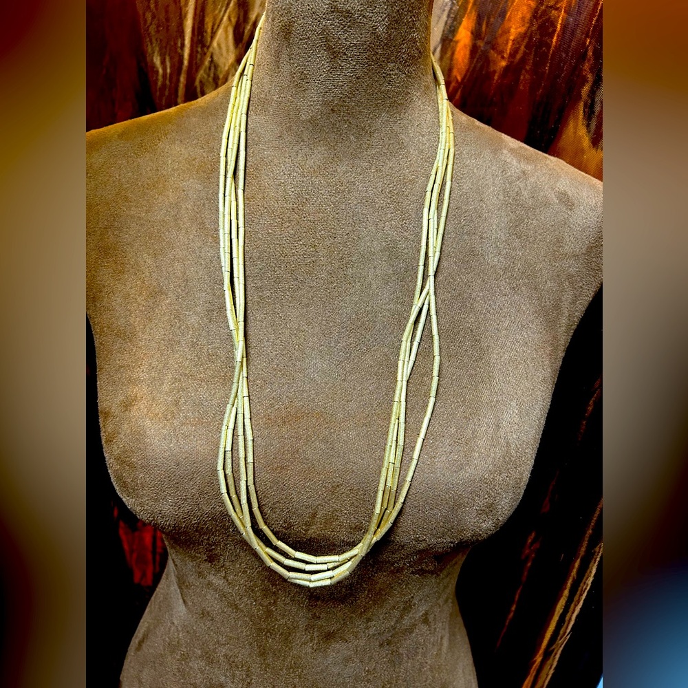 Liquid gold one long, necklace strand, a rarity indeed